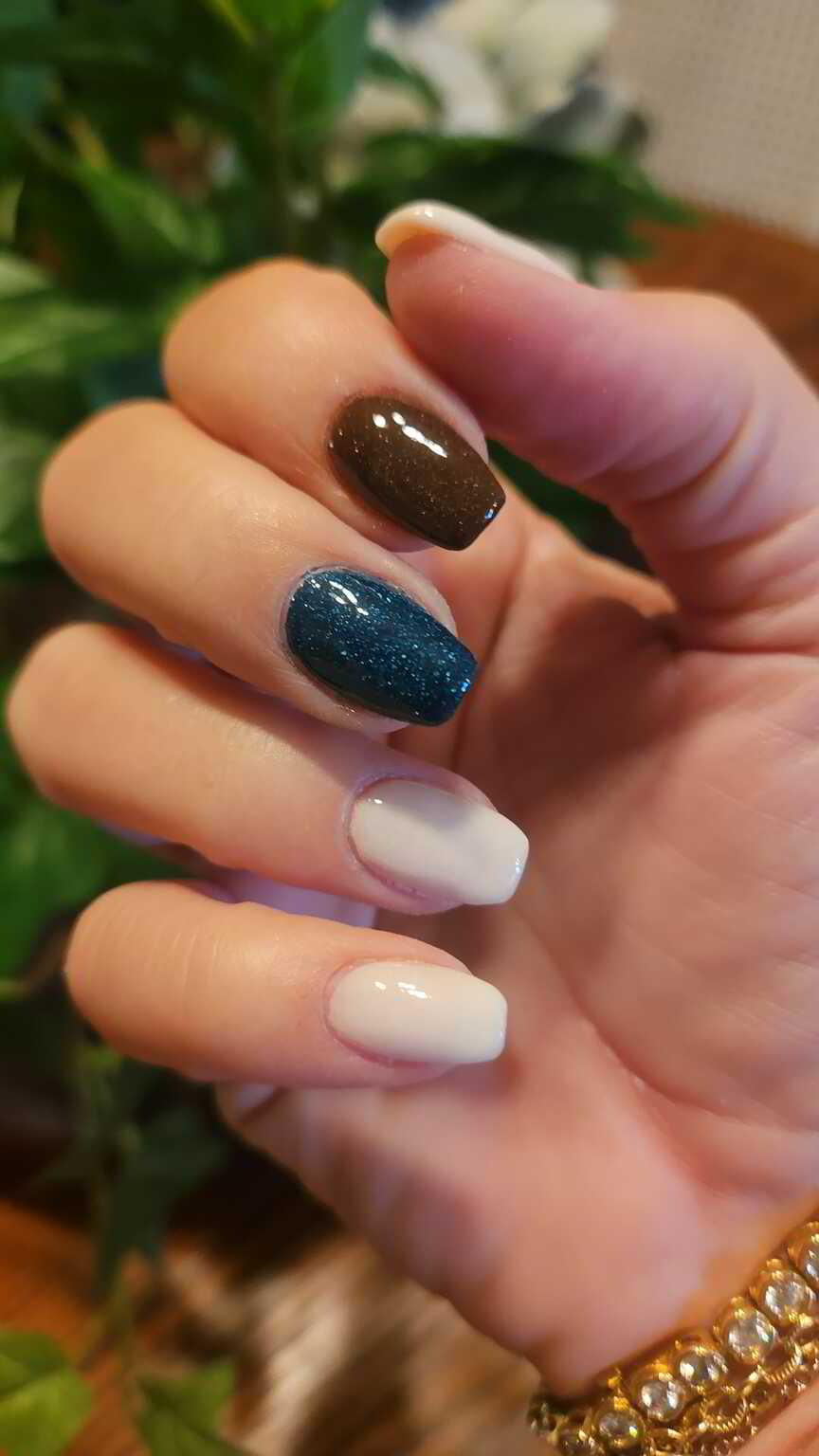 Nail polish manicure of shade Revel Duel, Revel Soul, Revel Mellow, 