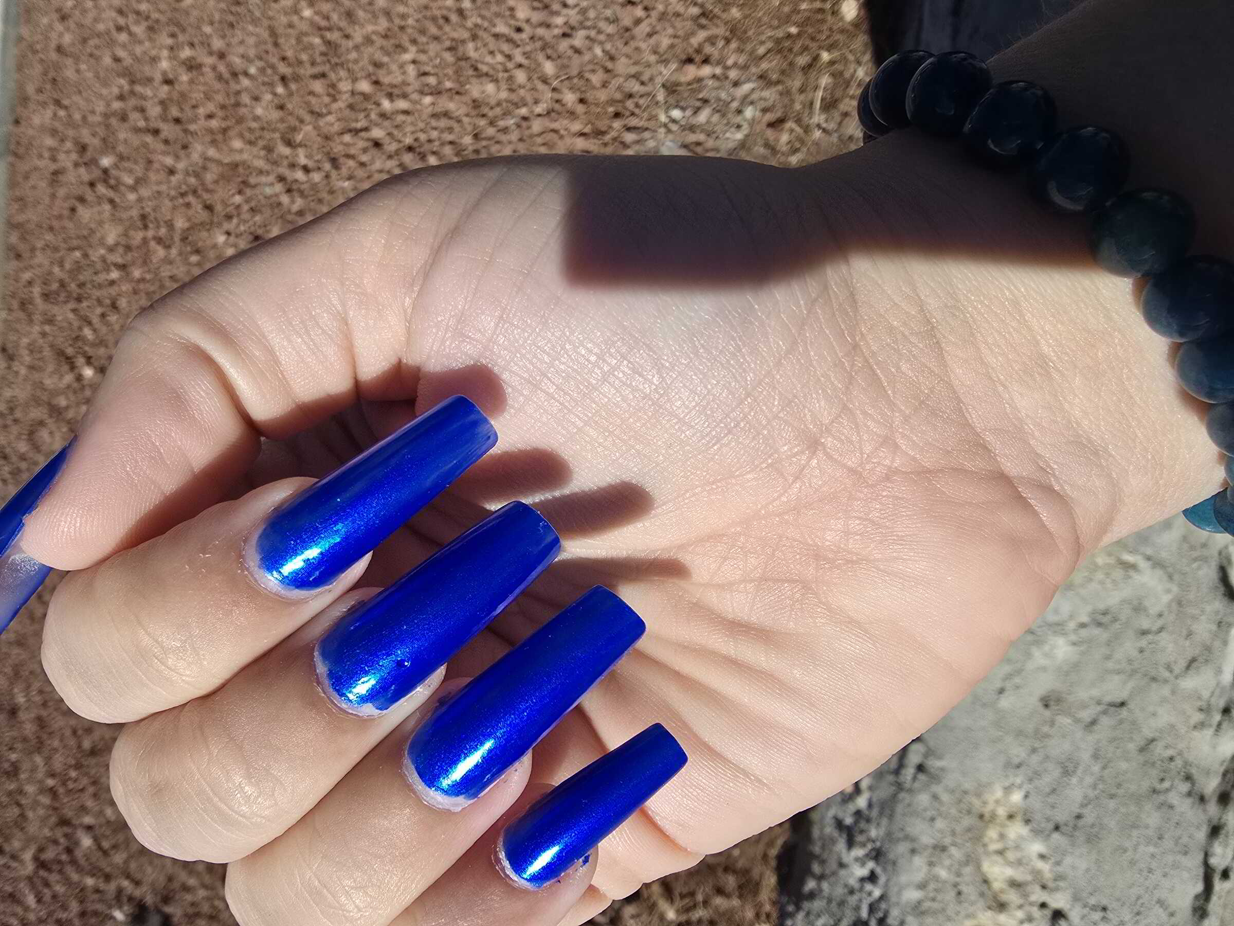 Nail polish manicure of shade China Glaze Frostbite, 