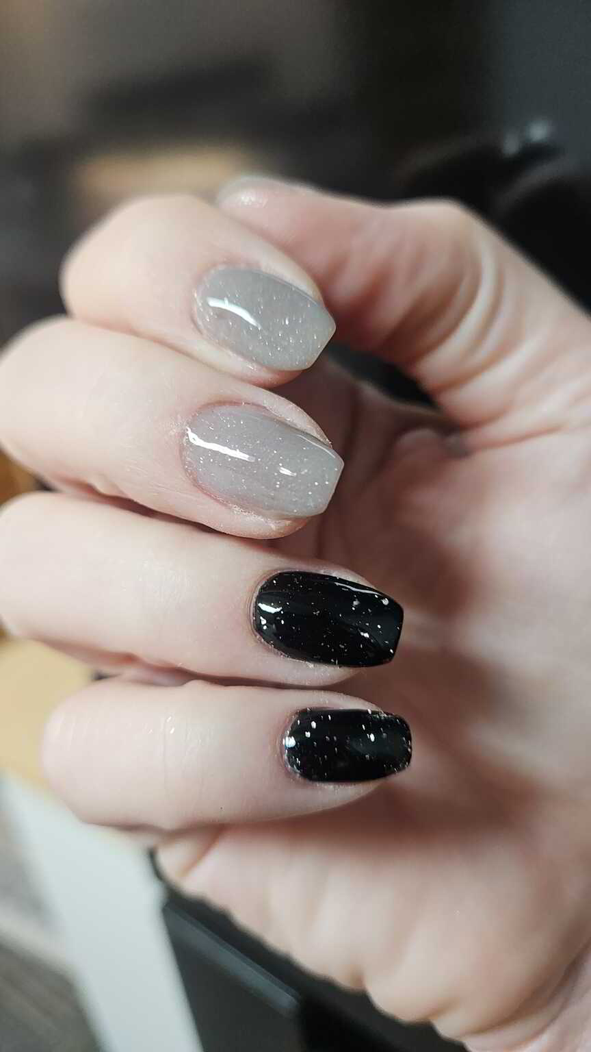 Nail polish manicure of shade Revel Knight Shift, Revel Piece Out