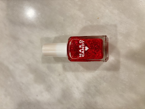 Nail polish swatch / manicure of shade Hard Candy Red Hot