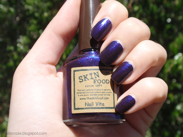 Nail polish swatch / manicure of shade Skin Food Violet Stone