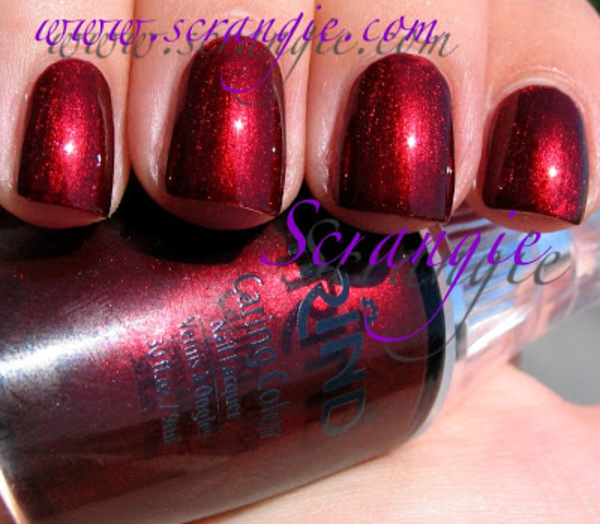 Nail polish swatch / manicure of shade Trind Caring Color Burgundy Shimmer CC119