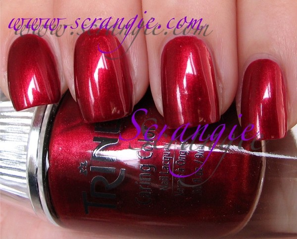 Nail polish swatch / manicure of shade Trind Caring Color Red Shimmer CC118