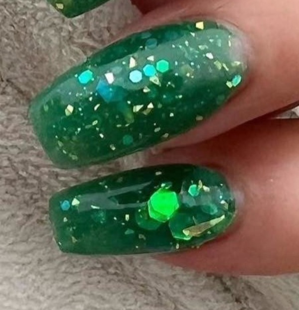 Nail polish swatch / manicure of shade Revel Emerald