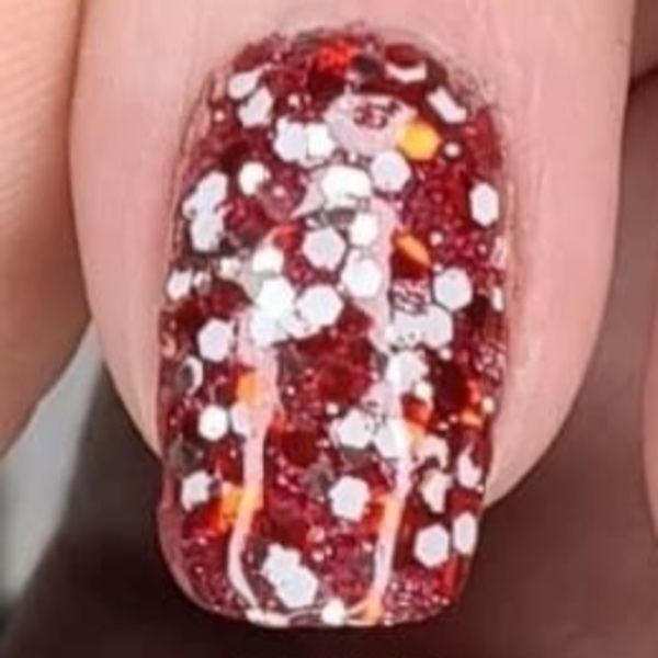 Nail polish swatch / manicure of shade Revel Candy Cane