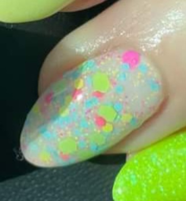 Nail polish swatch / manicure of shade Revel Bright Spot