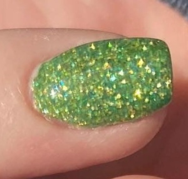 Nail polish swatch / manicure of shade Revel Shamrock