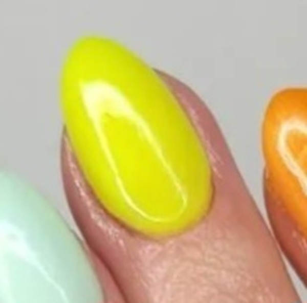 Nail polish swatch / manicure of shade Revel Limoncello