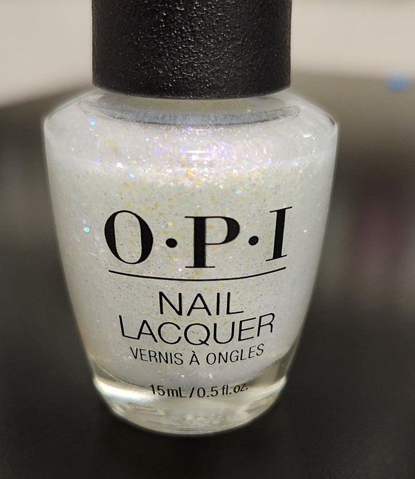 Nail polish swatch / manicure of shade OPI Snatch'd Silver