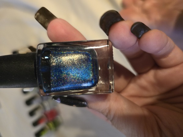 Nail polish swatch / manicure of shade Colors by Llarowe CBL addicts blue me away