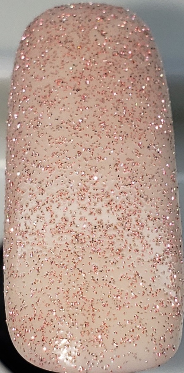 Nail polish swatch / manicure of shade Fancy Gloss Pink Reflective Topper