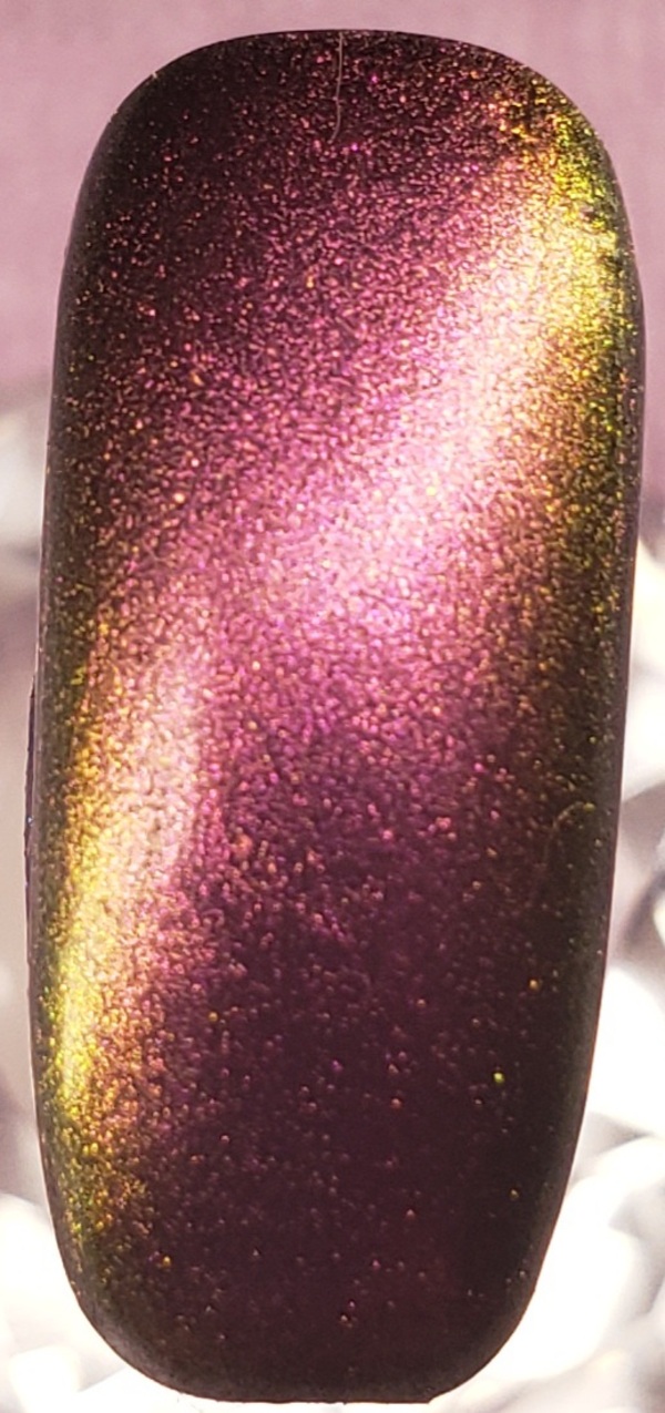 Nail polish swatch / manicure of shade Fancy Gloss Oil Spill