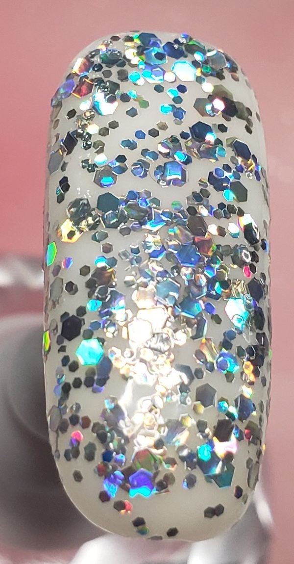 Nail polish swatch / manicure of shade Fancy Gloss Silver Holographic Mix