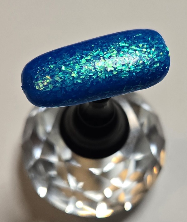 Nail polish swatch / manicure of shade Fancy Gloss Electric Waters